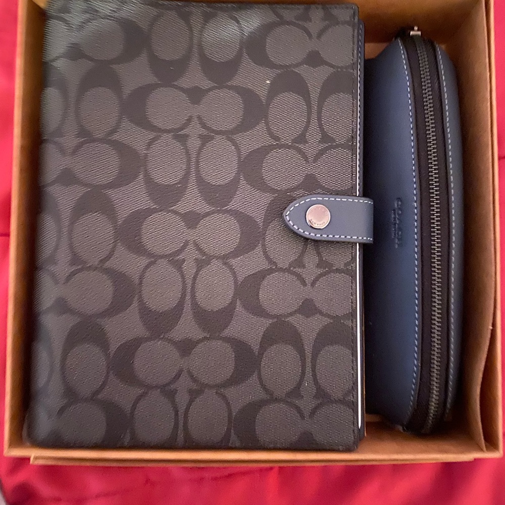 Coach notebook and pen case . New never used .